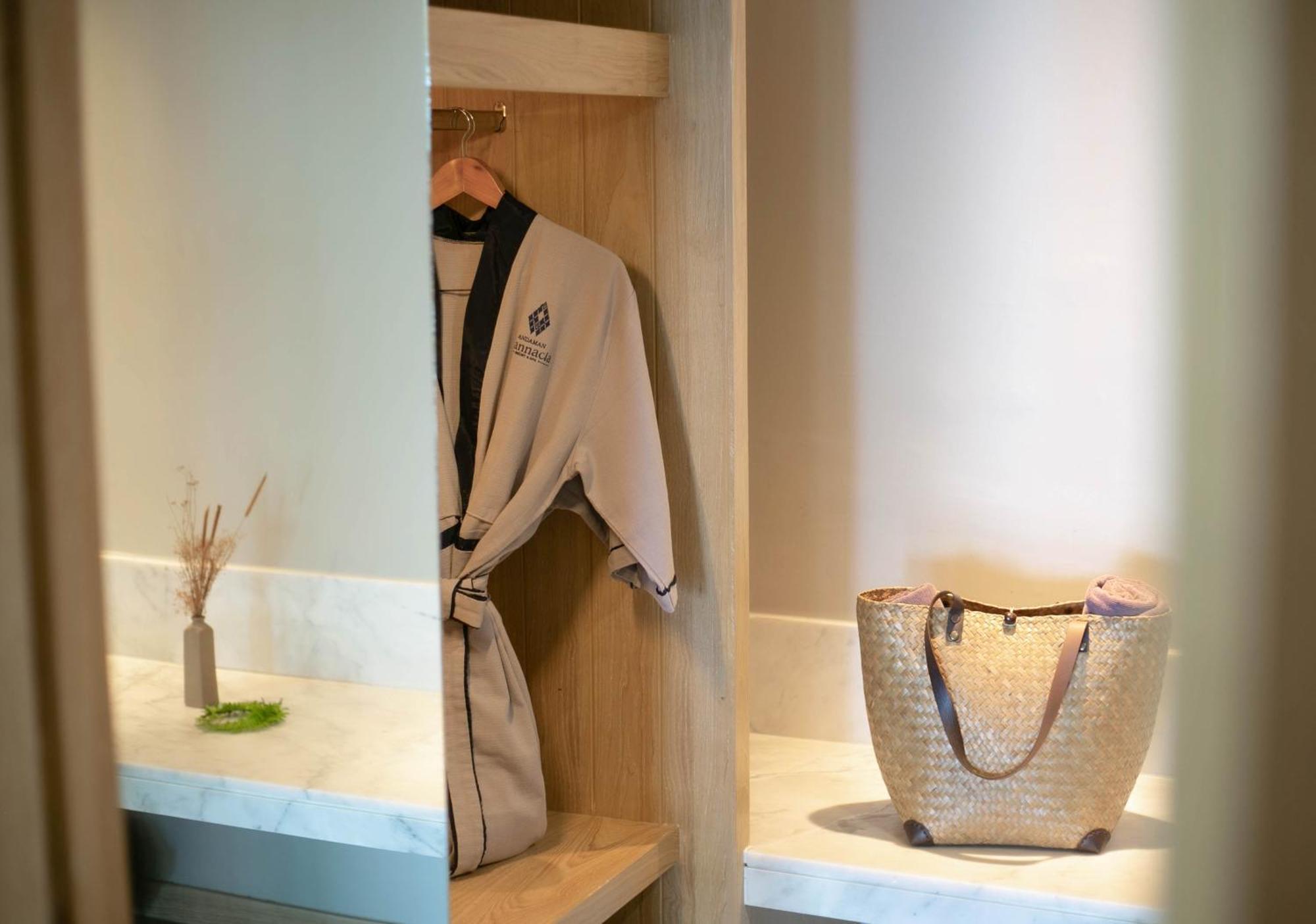 Andaman Cannacia Resort & Spa - Sha Extra Plus Kata-stranden Eksteriør bilde A bathrobe hanging in a closet